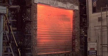 75mm vertical Fire Shutter closed automatically during tests for a fire resistant barrier